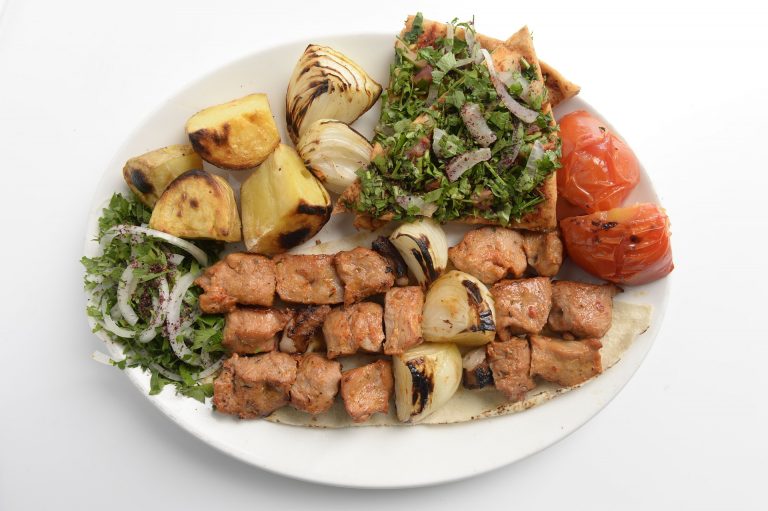 Lebanese Meat Skewers Dish with Herbs and Vegetables